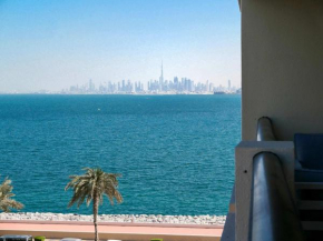Ambient 1BR Apartment On The Beach at 5 Star Resort